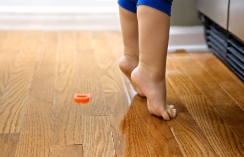 Toddler feet on warm floor