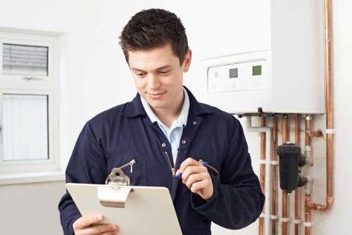 Engineer completing a boiler installation