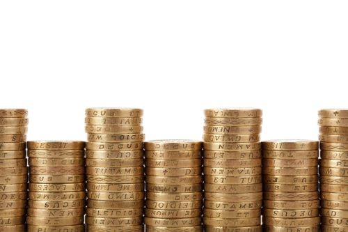Stacks of coins; combi boiler prices